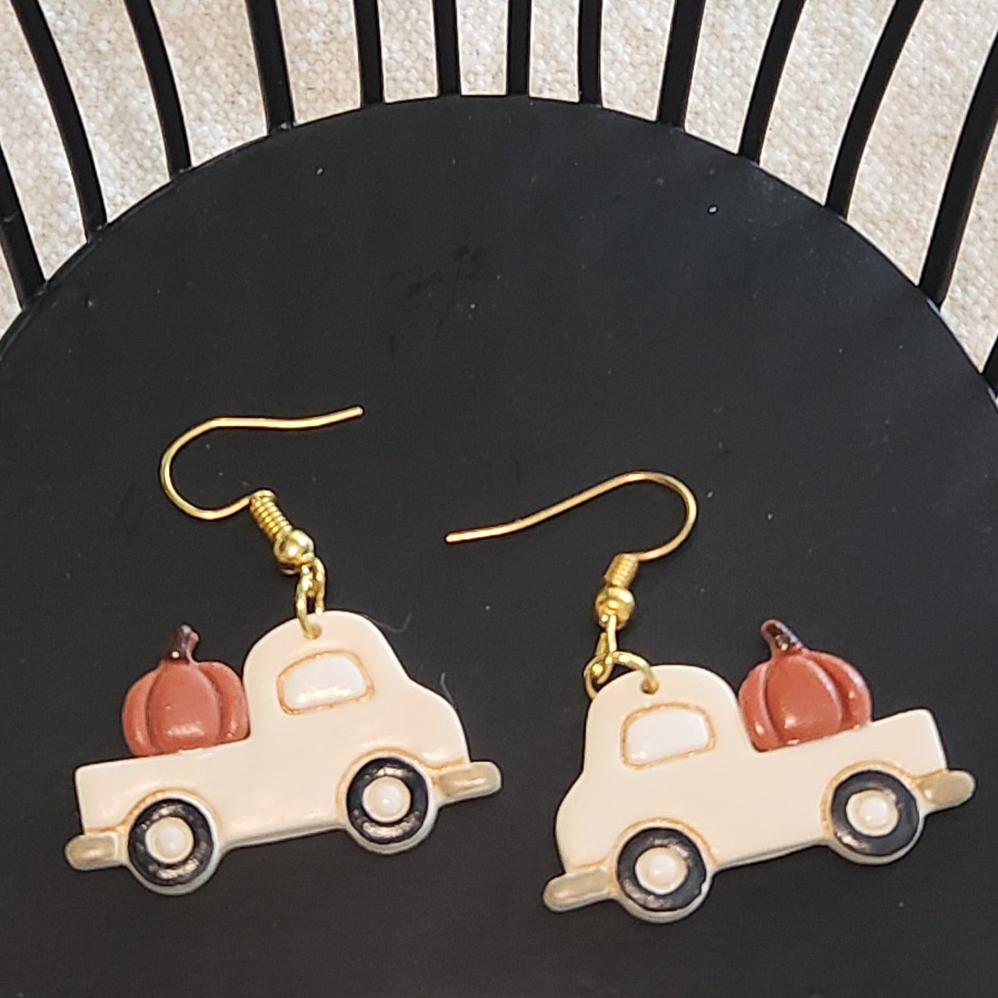White truck earrings with orange pumpkins